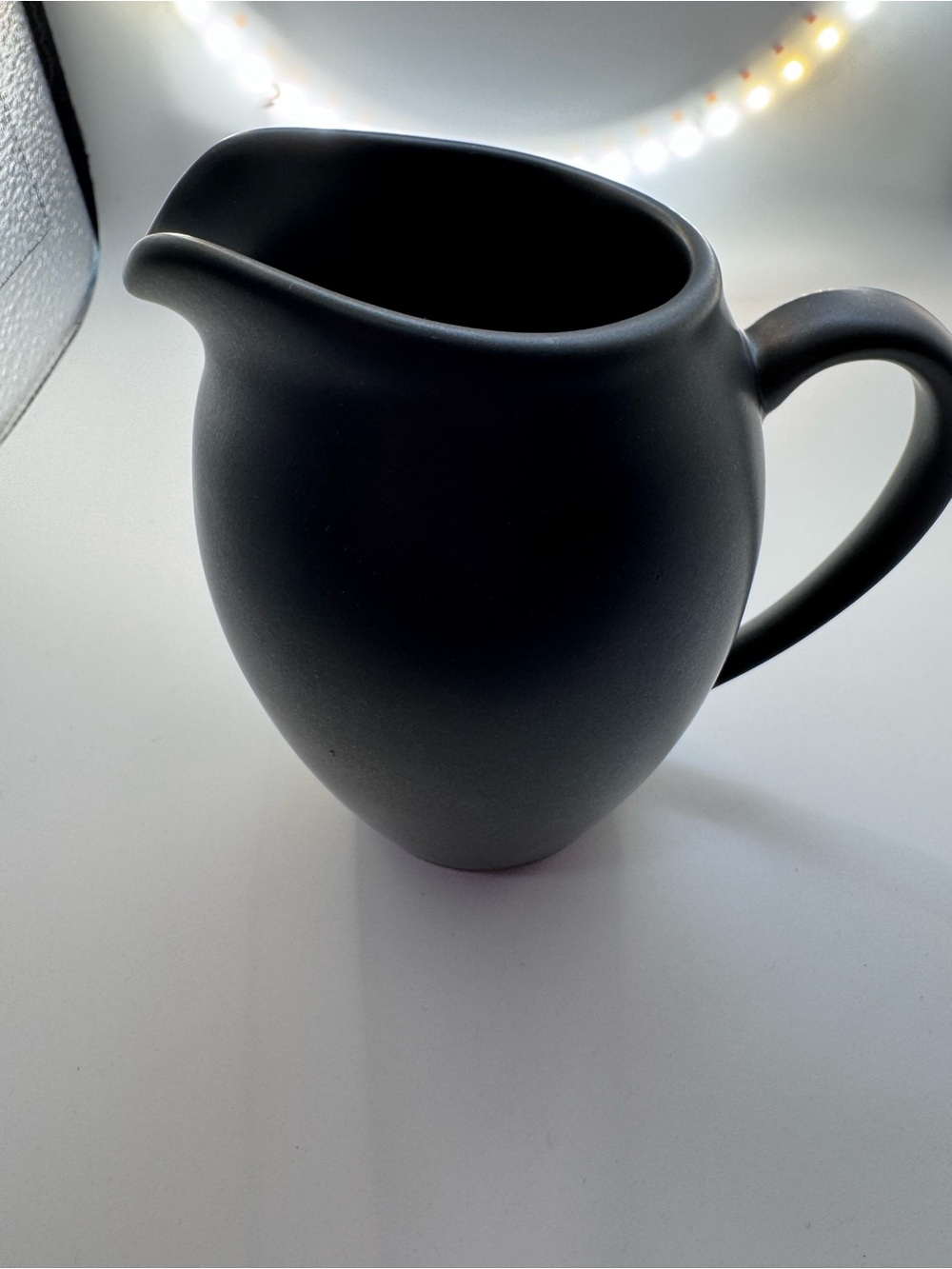 Noritake Matte Black Ceramic Creamer with Curved Spout and Sugar Bowl with Lid
